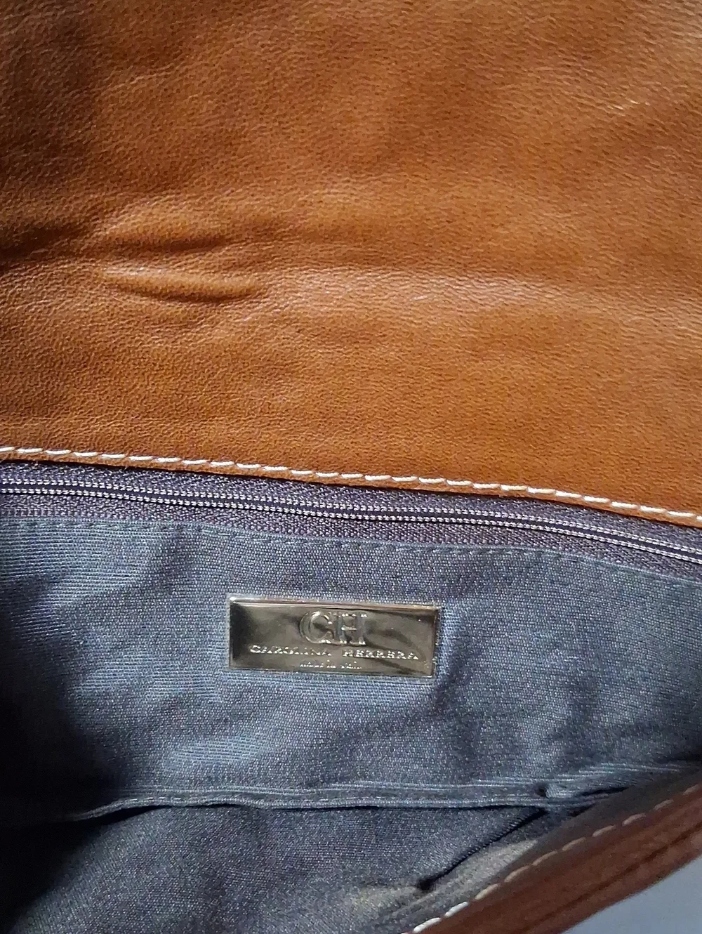 Carolina Herrera glove keather clutch